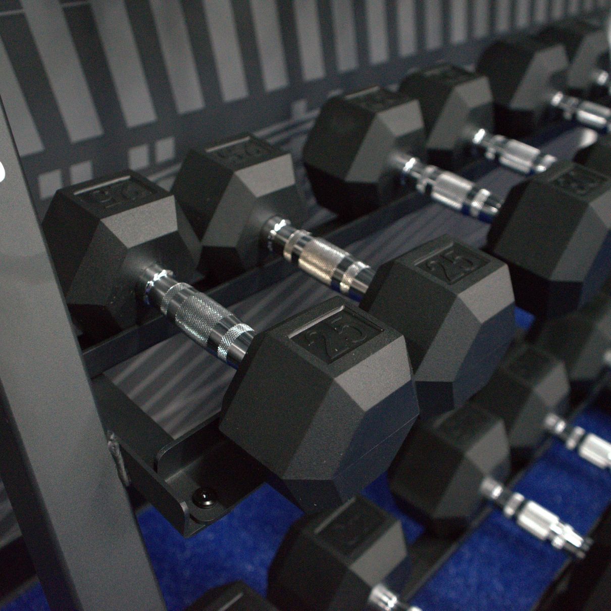 Gronk Fitness 3-Tier Dumbbell Rack close-up with dumbbells