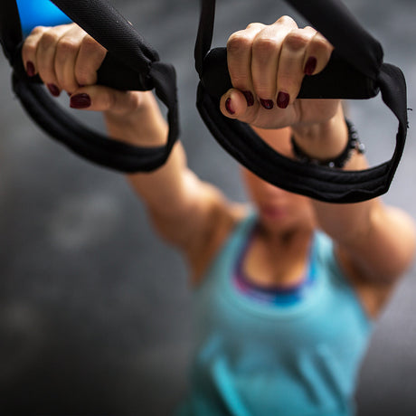TRX Home Suspension Trainer in use close-up